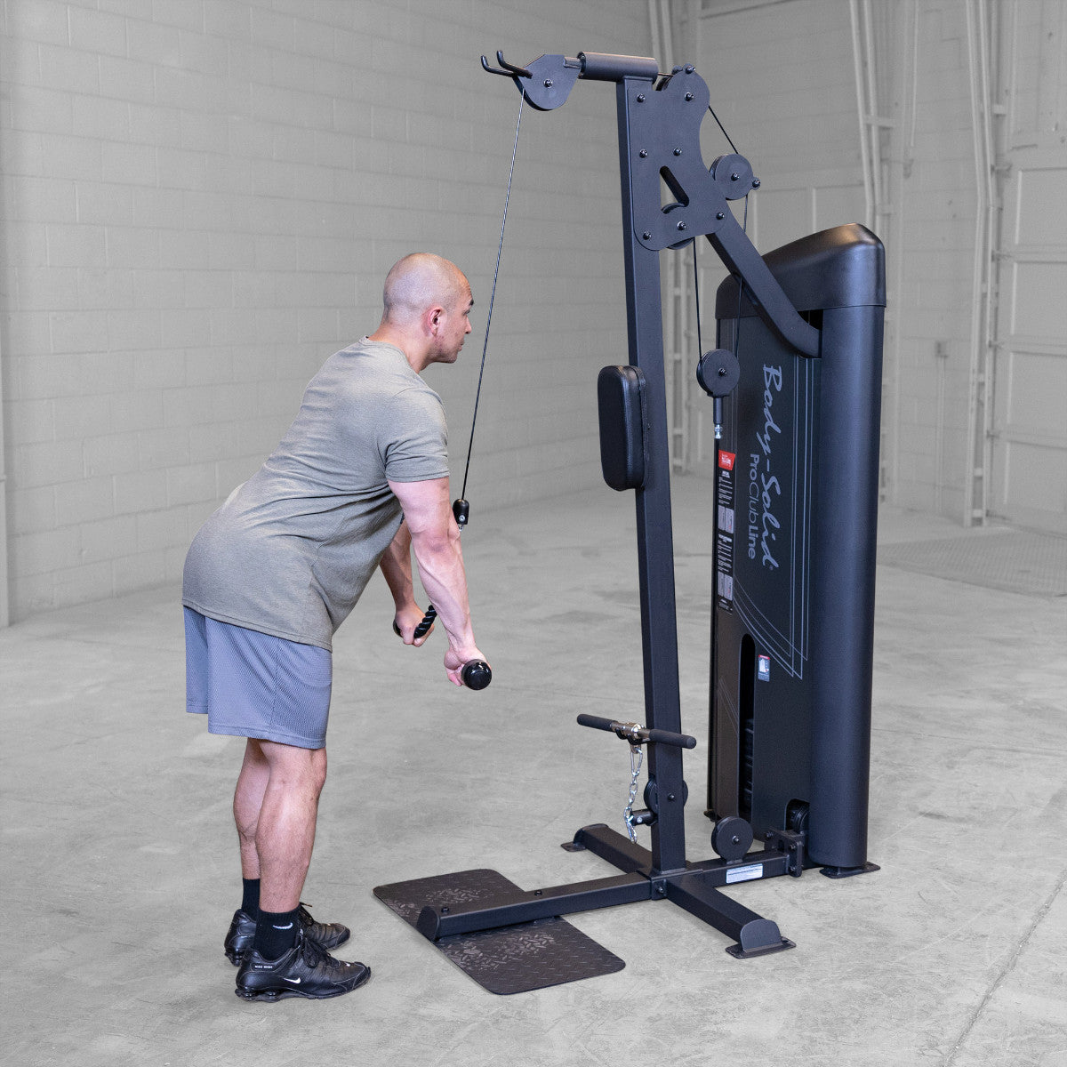Body-Solid S2BTPX Pro ClubLine Series 2 Dual Bicep & Triceps Machine in gym with man exercising