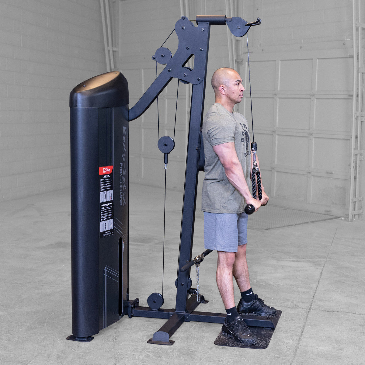 Body-Solid S2BTPX Pro ClubLine Series 2 Dual Bicep & Triceps Machine in gym with man exercising