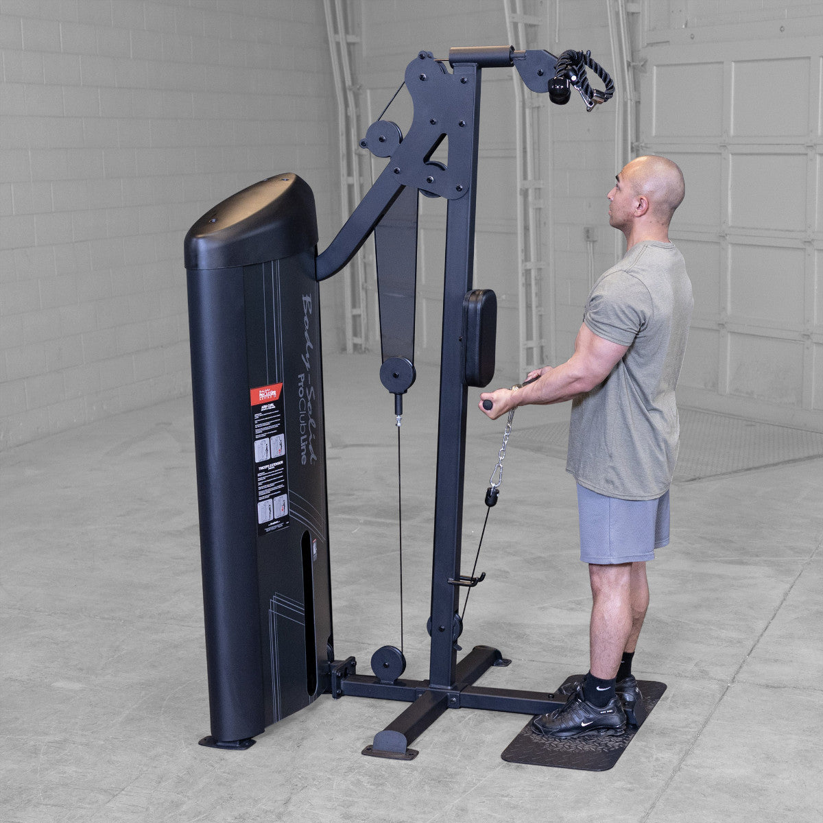 Body-Solid S2BTPX Pro ClubLine Series 2 Dual Bicep & Triceps Machine in gym with man exercising