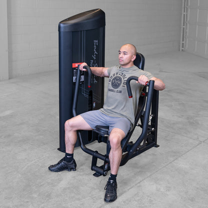 Body-Solid S2CPX Pro ClubLine Series 2 Chest Press Machine woman exercising in gym