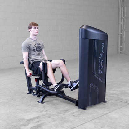 Body-Solid S2IOTX Pro ClubLine Series 2 Dual Inner Outer Thigh Machine in gym with man exercising