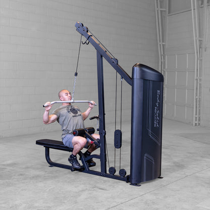 Body-Solid S2LATX Pro ClubLine Series 2 Dual Lat & Seated Row Machine with man exercising
