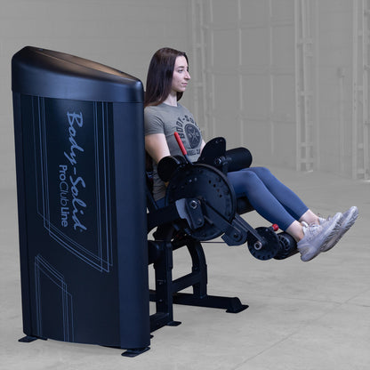 Body-Solid S2LECX Pro ClubLine Series 2 Dual Leg Curl & Extension Machine in gym with woman exercising