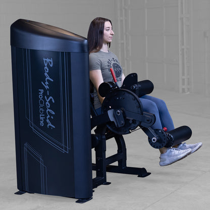 Body-Solid S2LECX Pro ClubLine Series 2 Dual Leg Curl & Extension Machine in gym with woman exercising