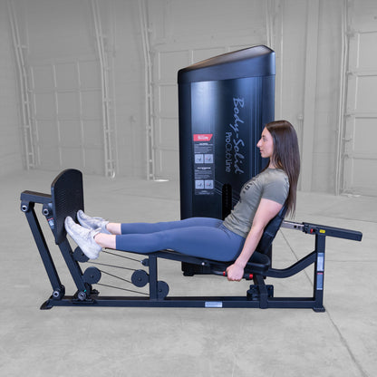 Body-Solid S2LPCX Pro ClubLine Series 2 Leg & Calf Press in gym with woman exercising.