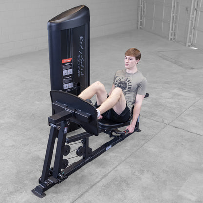 Body-Solid S2LPCX Pro ClubLine Series 2 Leg & Calf Press in gym with man exercising.