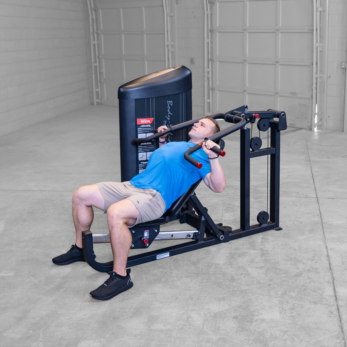 Body-Solid S2MPX Pro ClubLine Series 2 Flat, Incline, & Shoulder Press Machine man exercising