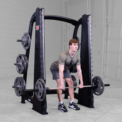 Body-Solid Pro ClubLine SCB1000B Counter Balanced Smith Machine man exercising