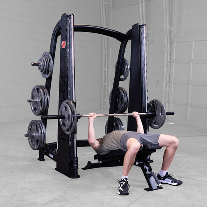 Body-Solid Pro ClubLine SCB1000B Counter Balanced Smith Machine man exercising