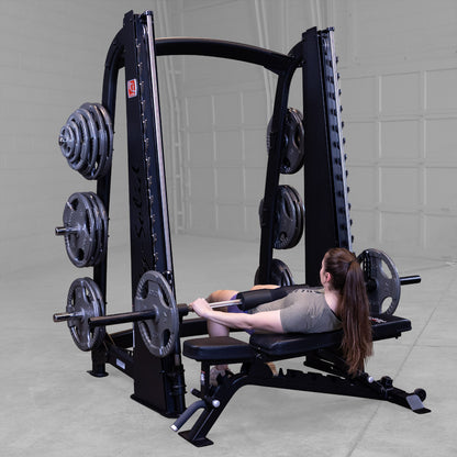 Body-Solid Pro ClubLine SCB1000B Counter Balanced Smith Machine woman exercising