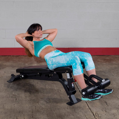 Woman doing situps on a Body-Solid SFID425 Pro ClubLine Flat Incline Decline Bench