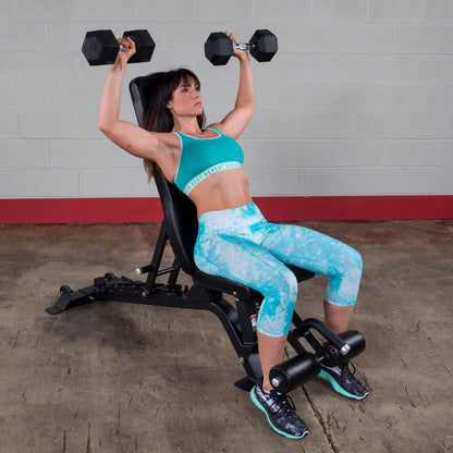 Woman working out on a Body-Solid SFID425 Pro ClubLine Flat Incline Decline Bench