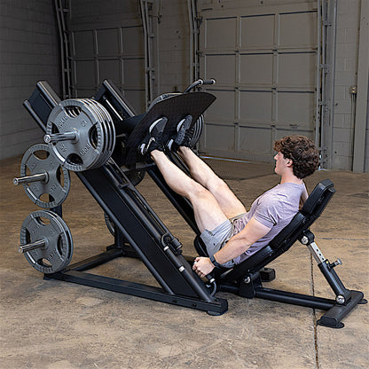 Body-Solid Pro Clubline SGLP500 Leg Press with man exercising