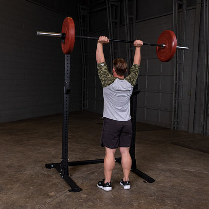 Body-Solid Pro ClubLine SPR250 Squat Rack man exercising