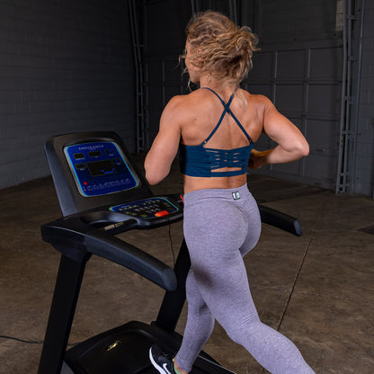 Body-Solid Endurance T25 Folding Treadmill woman running