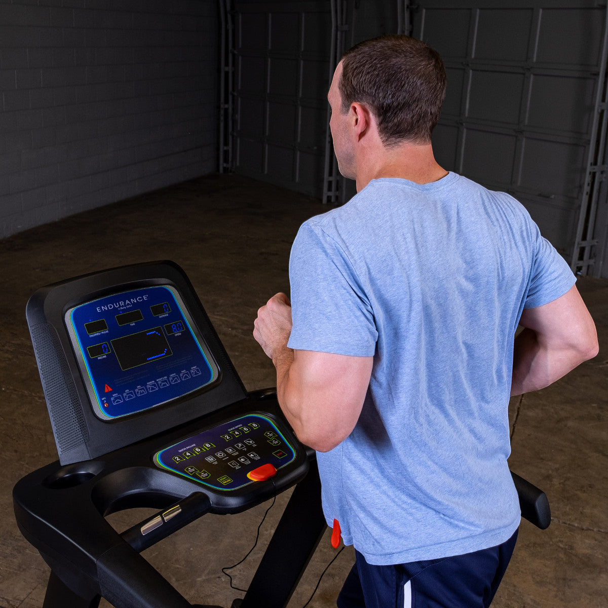 Body-Solid Endurance T25 Folding Treadmill man running