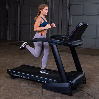Body-Solid Endurance T25 Folding Treadmill woman running