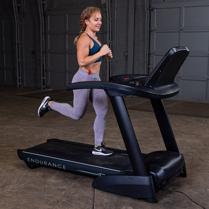 Body-Solid Endurance T25 Folding Treadmill woman running