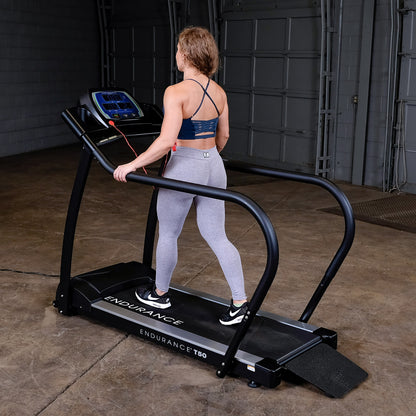 Body-Solid Endurance T50 Walking Treadmill with woman walking