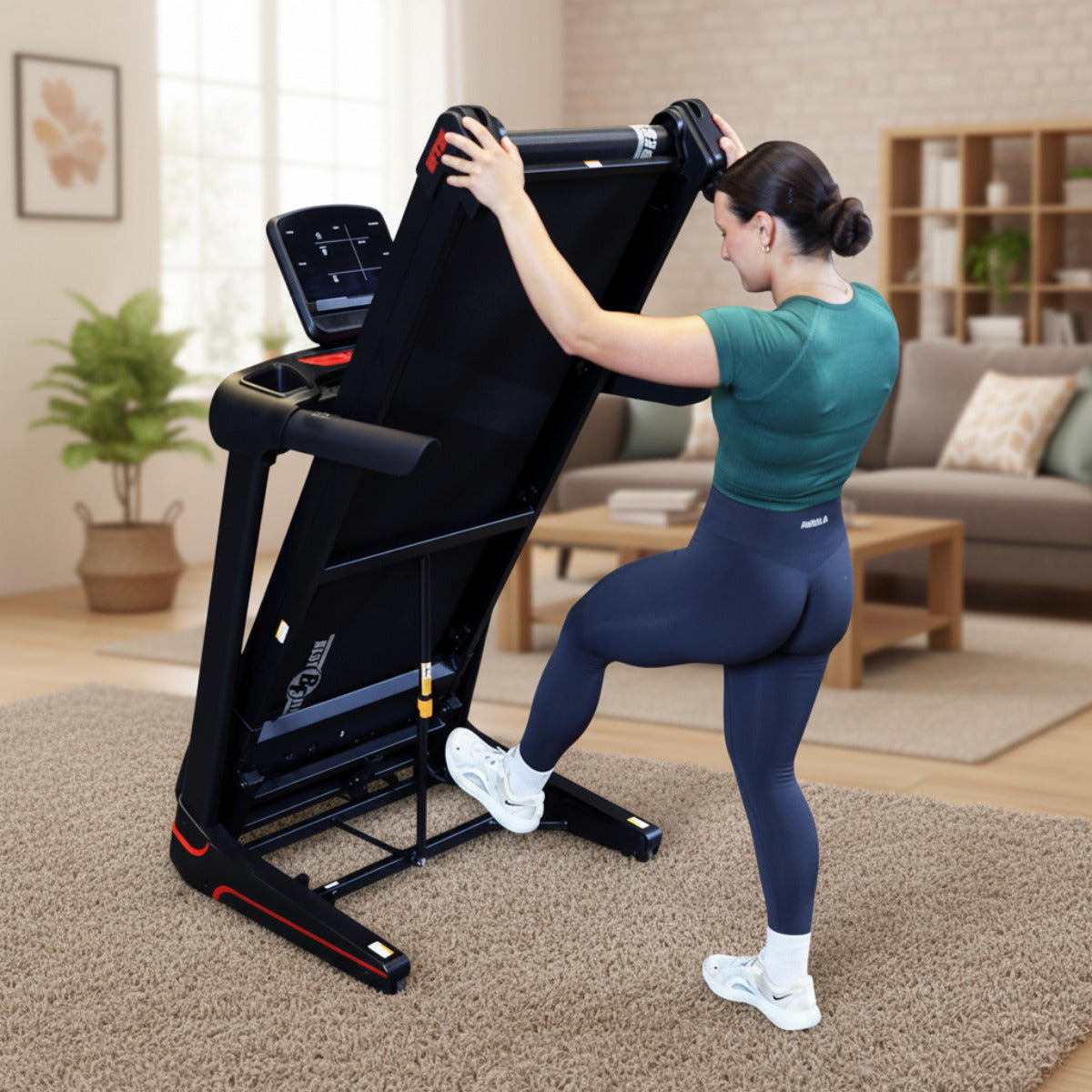 Body-Solid Best Fitness BFT25 Folding Treadmill with LED Console woman folding treadmill