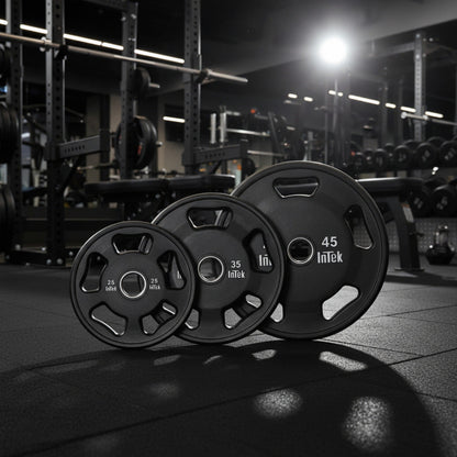 Intek Strength Armor Series Urethane Olympic Plates in gym