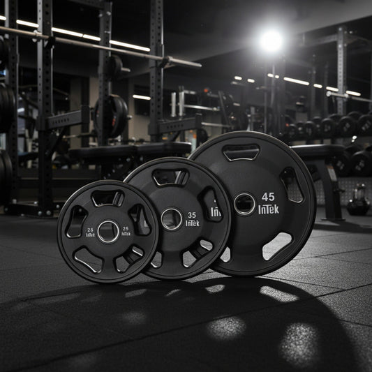 Intek Strength Armor Series Urethane Olympic Plates in gym