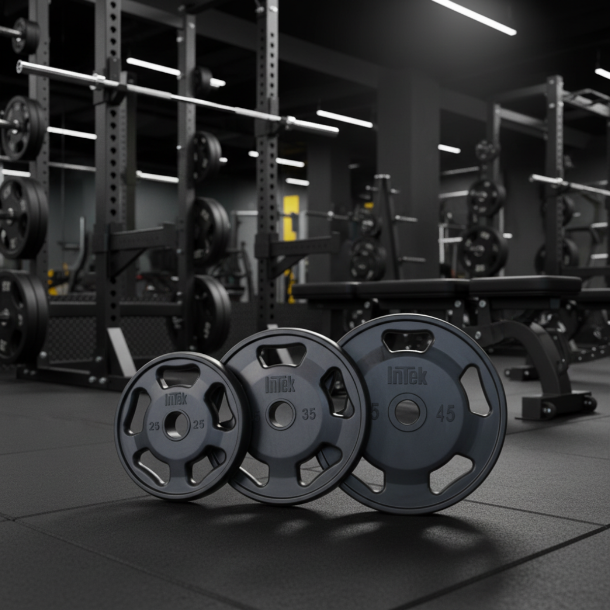 Intek Strength RRO Champion Series Rubber Olympic Plates in gym