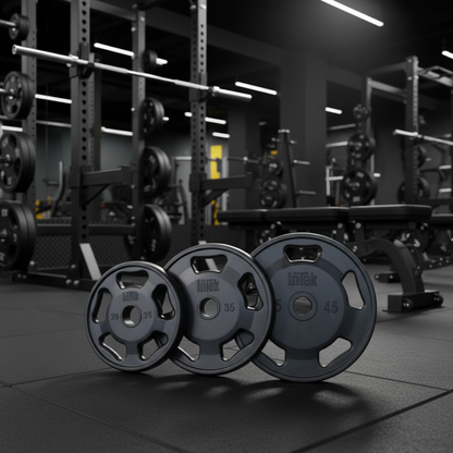 Intek Strength RRO Champion Series Rubber Olympic Plates in gym