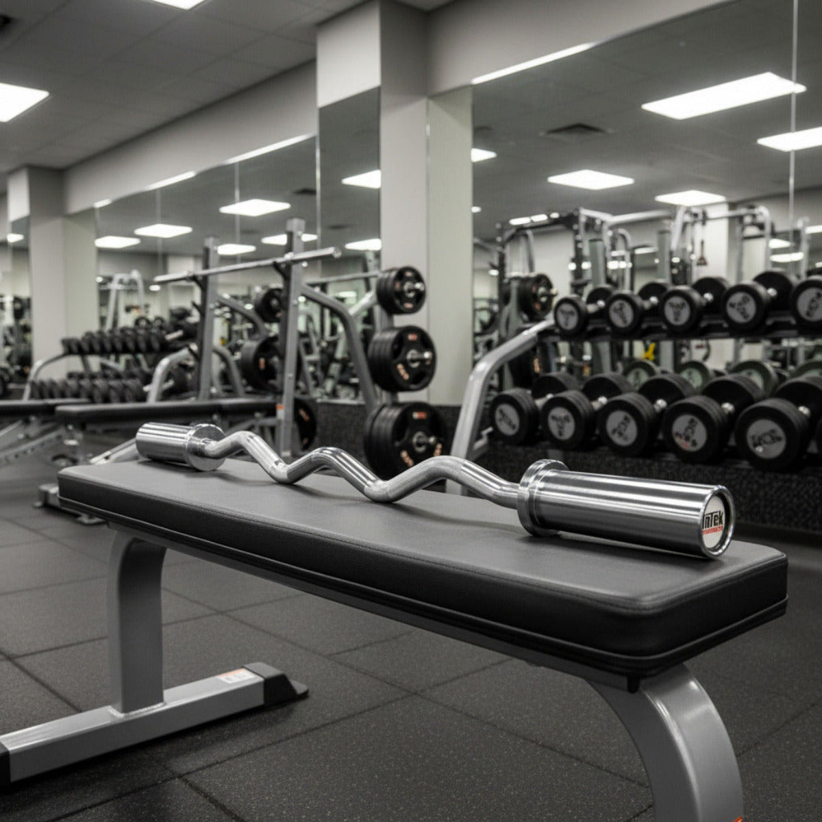 Intek Strength SOEZ-CP Olympic Hard Chrome EZ Curl Bar in gym
