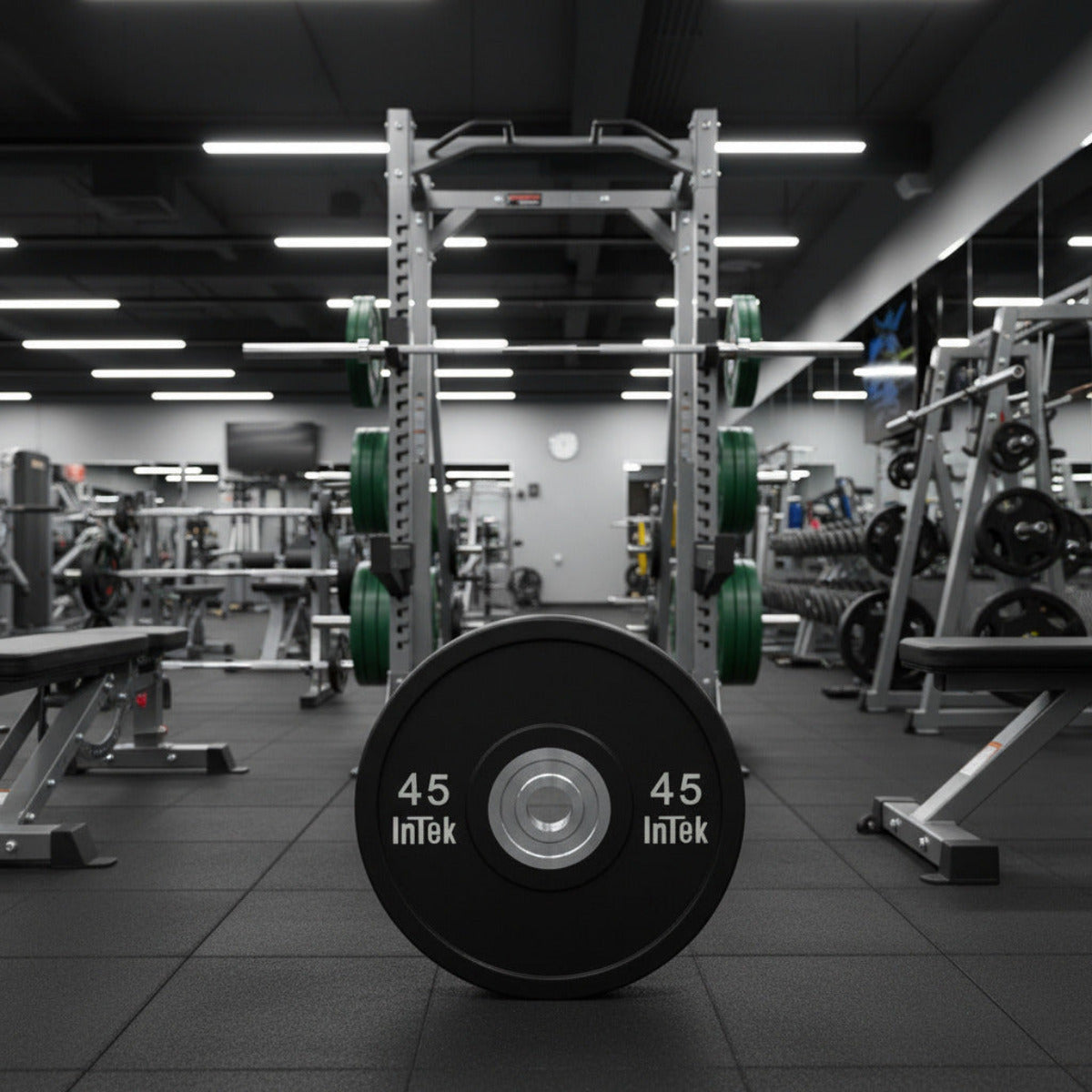 Intek Strength Armor Series IBBN Black Urethane Bumper Plates LBS in gym