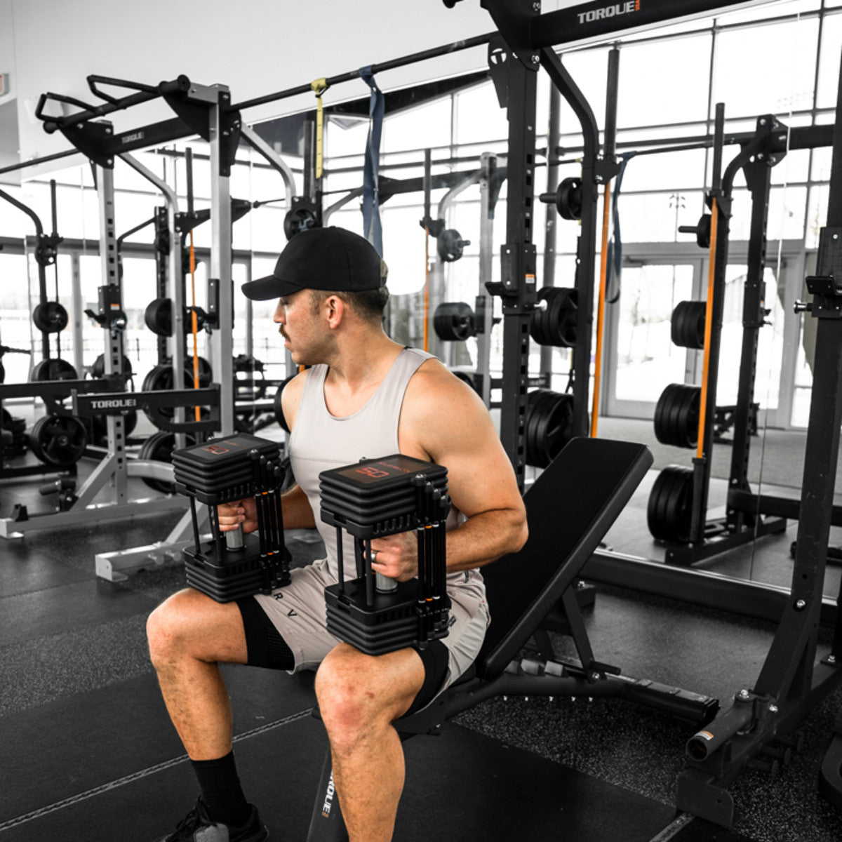 Man using PowerBlock Pro 100 in a gym.