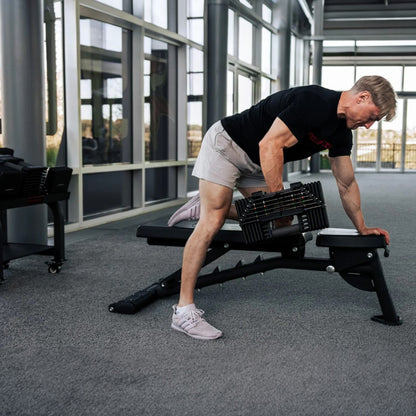 Man doing Single-Arm Dumbbell Row with PowerBlock Commercial Pro 175.