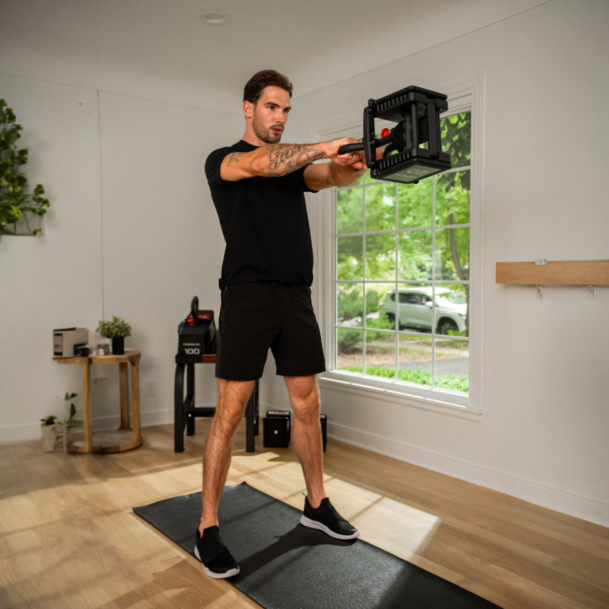 PowerBlock Pro 100 Kettlebell Handle swing exercise.