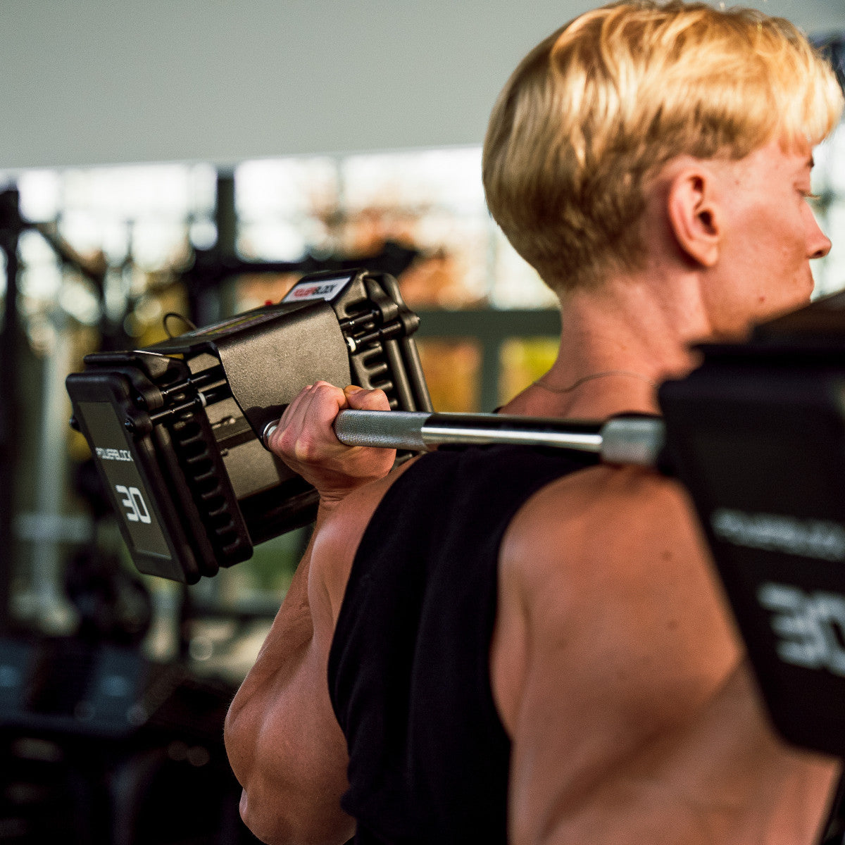 PowerBlock Pro 100 EXP Straight Bar exercise.