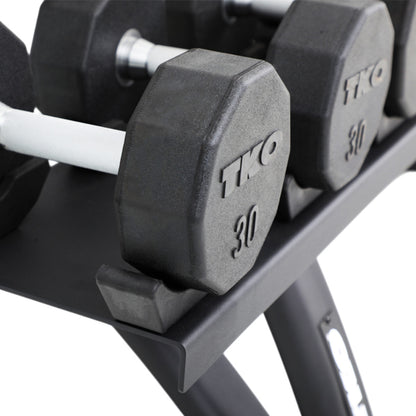 TKO 7051B-BK 10 Pair Dumbbell Saddle Rack with dumbbells close up on white background