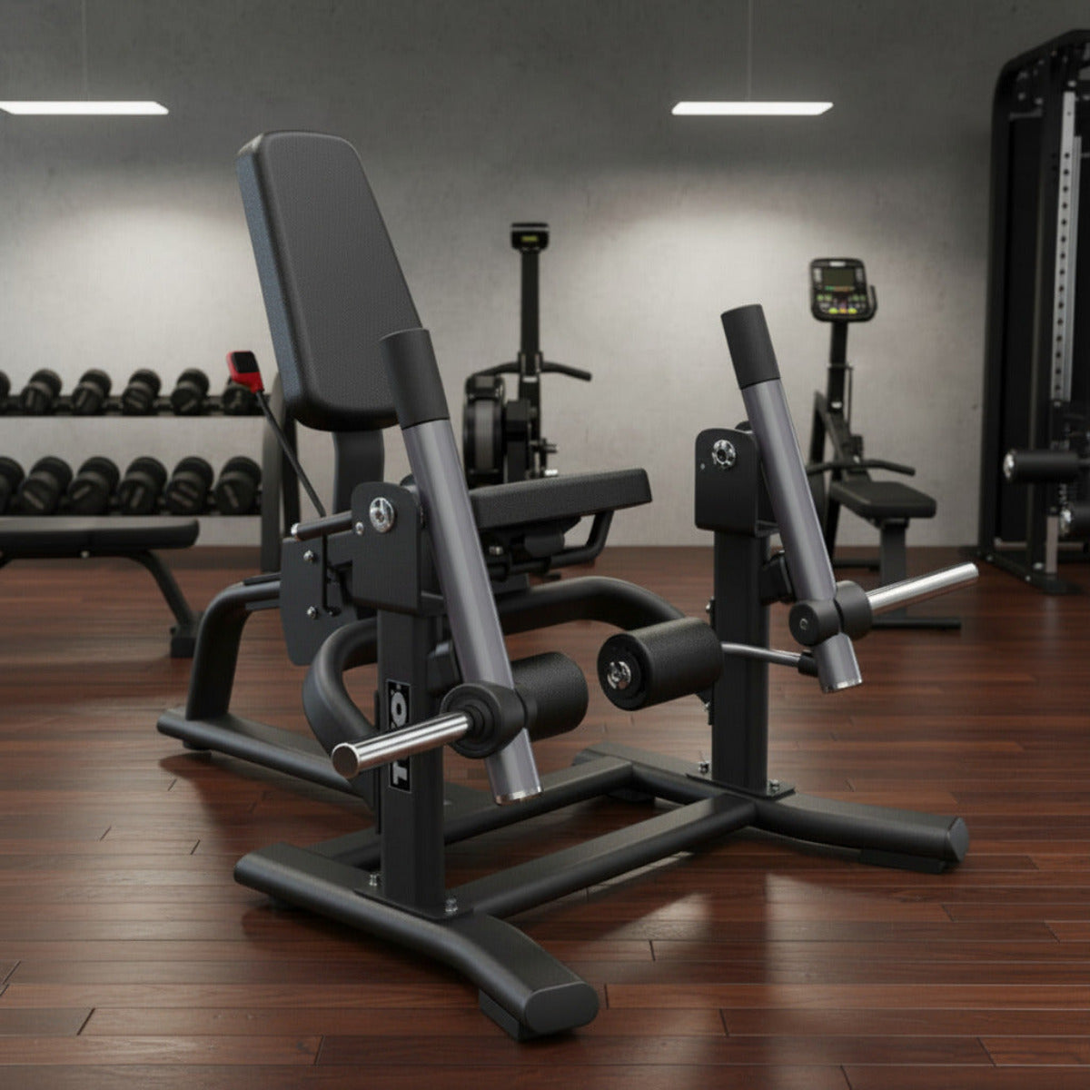 TKO 719LE Signature Plate Loaded Unilateral Leg Extension in gym