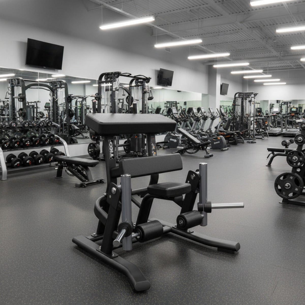 TKO 720LC Signature Plate Loaded Unilateral Leg Curl in gym