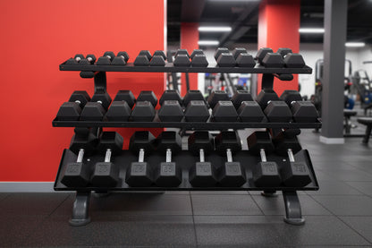 TKO S890-TXRE15 5 to 75LB Tri-Grip Rubber Hex Dumbbell Set w/Rack in gym with red walls