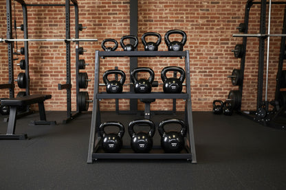 TKO S856-KBV5-50 5-50lb Vinyl Kettlebell set w/ 3 tier rack in gym