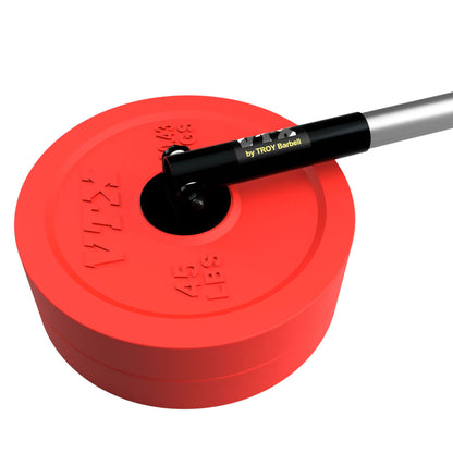 Troy Barbell VTX G-LAND Post Landmine with weight plates.