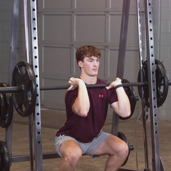 Body-Solid Powerline PSM200 Smith Machine man exercising